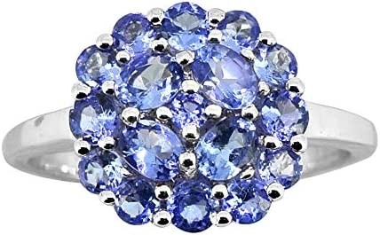 白いダイヤモンドのアクセントの純銀製リング宝石類との0.25カラットTanzanite