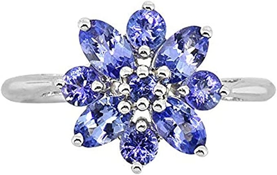 白いダイヤモンドのアクセントの純銀製リング宝石類との0.25カラットTanzanite