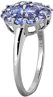 白いダイヤモンドのアクセントの純銀製リング宝石類との0.25カラットTanzanite