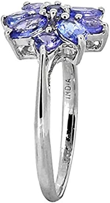 白いダイヤモンドのアクセントの純銀製リング宝石類との0.25カラットTanzanite