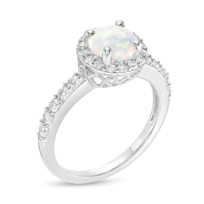 楕円形のオパールおよび1/15 CT。T.W. Diamond Bypassは純銀製のすねリングを裂いた